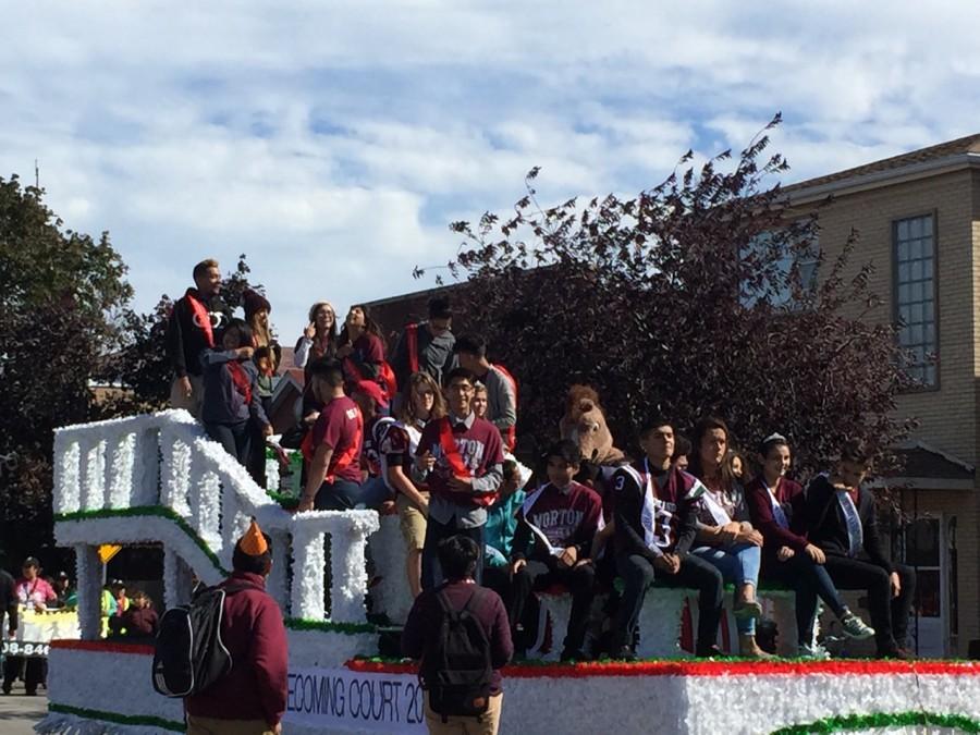 The Homecoming parade featuring the schools Homecoming courts is a time-honored tradition.