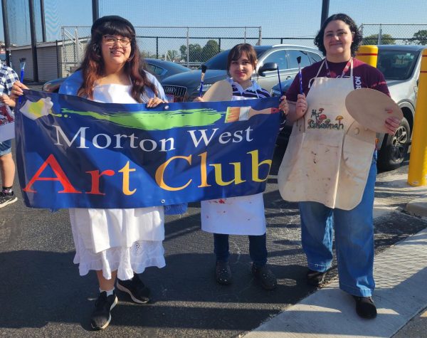 Art Club sponsor and leaders during Mortons Homecoming Parade. Alexa Rodriguez (left), Ariani Hernandez (middle), Ms. Ghanimah (right).