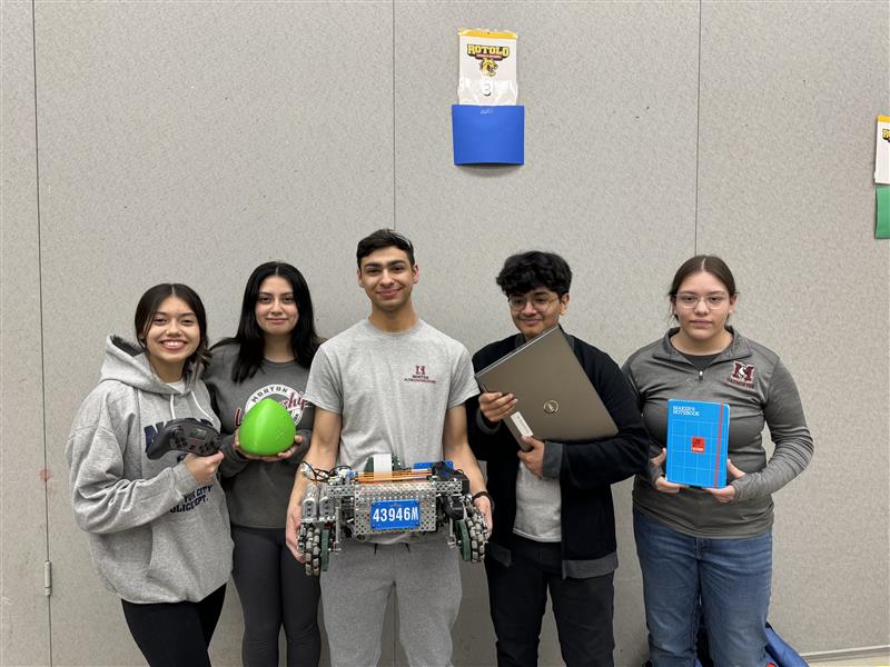 One of three Robotics Clubs team. Xiomi De La Paz (left), Steffany Gonzalez (second from the left), Ethan Villareal (middle), David Ortiz (second from the right), and Fatima Martinez (right).